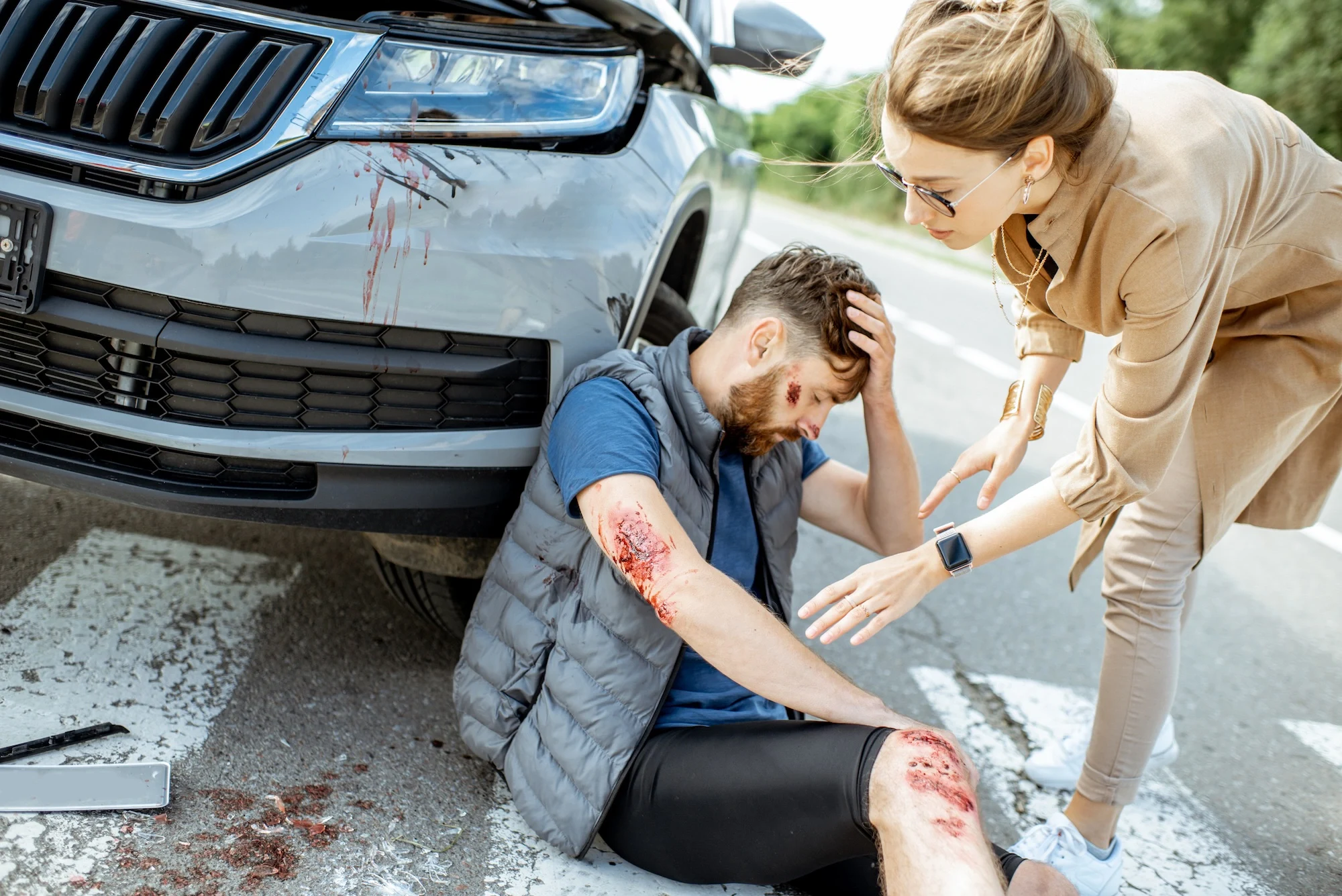 pedestrian injured by a car